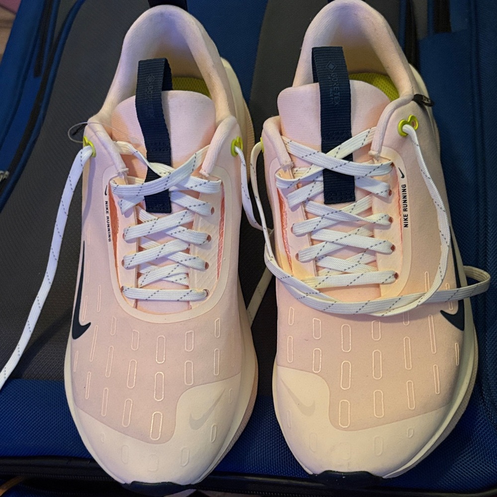 Soft pink Nike running  sneakers